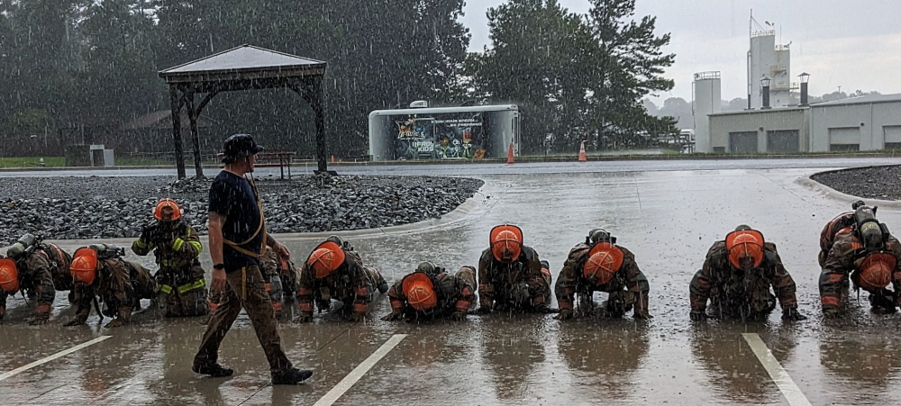 Fire recruits in the rain